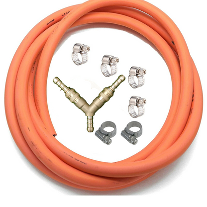 Orange hose with brass connectors and clamps on a white background