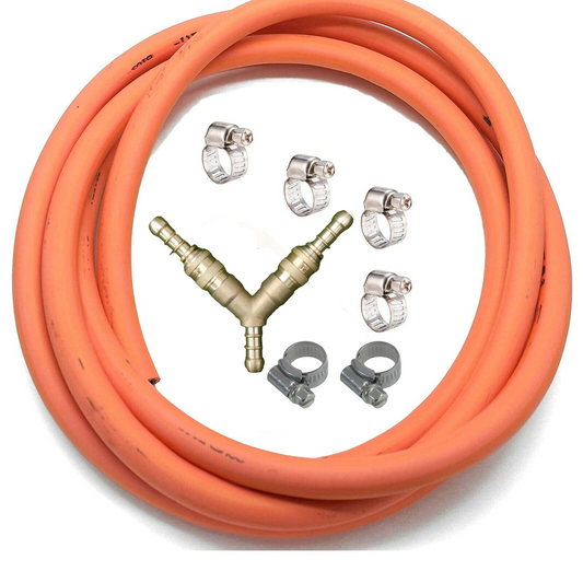 Orange hose with brass connectors and clamps on a white background